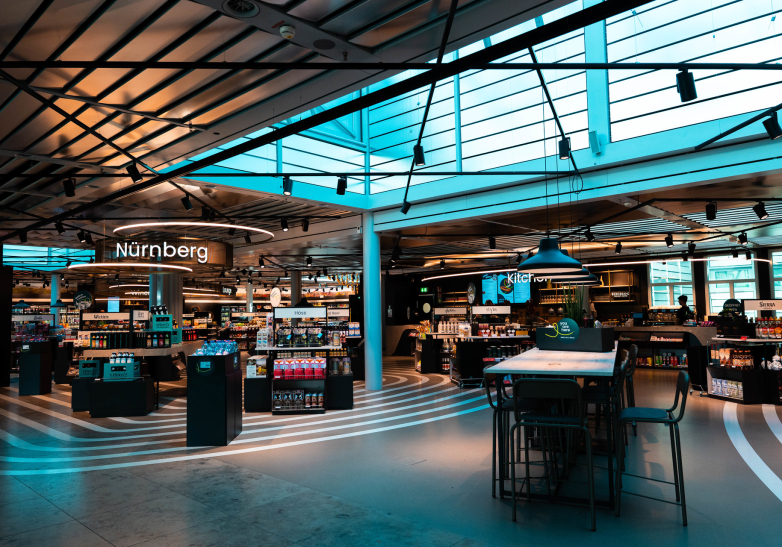 Travel Retail mit einladendem Ambiente und Genussmomenten Travel Retail mit einladendem Ambiente und Genussmomenten